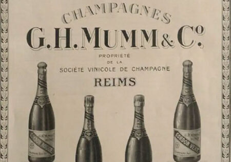 Historic advertisement in French for G.H. Mumm Champagnes showing illustrations of wine bottles and the company logo